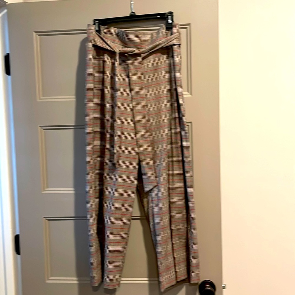 1state modern rebel color rich black pants with tie and side zipper.